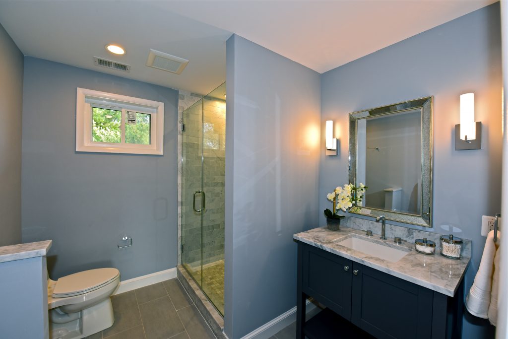 masculine yet elegant bedroom in mclean virginia second story addition by glickman design build